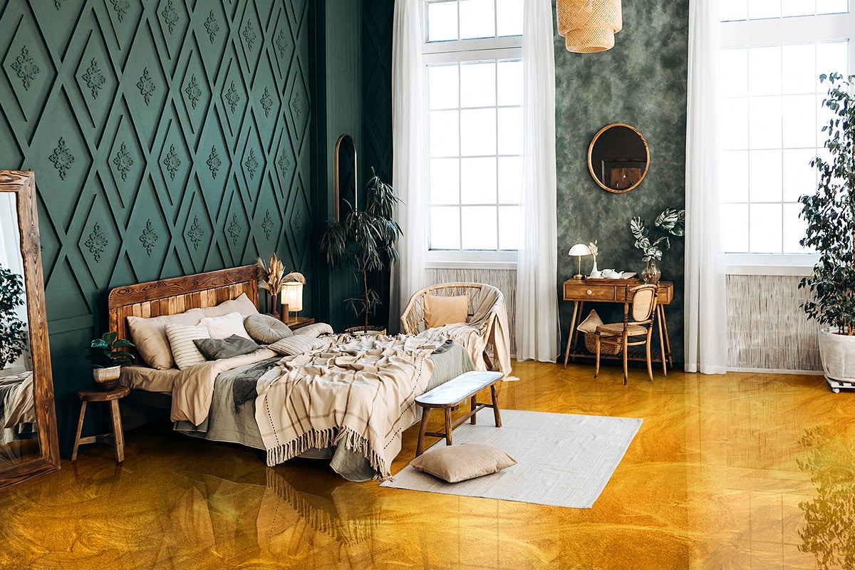Cozy bedroom interior in boho style with wooden furniture, console table, textiles, green walls, large windows and potted plants. Empty space